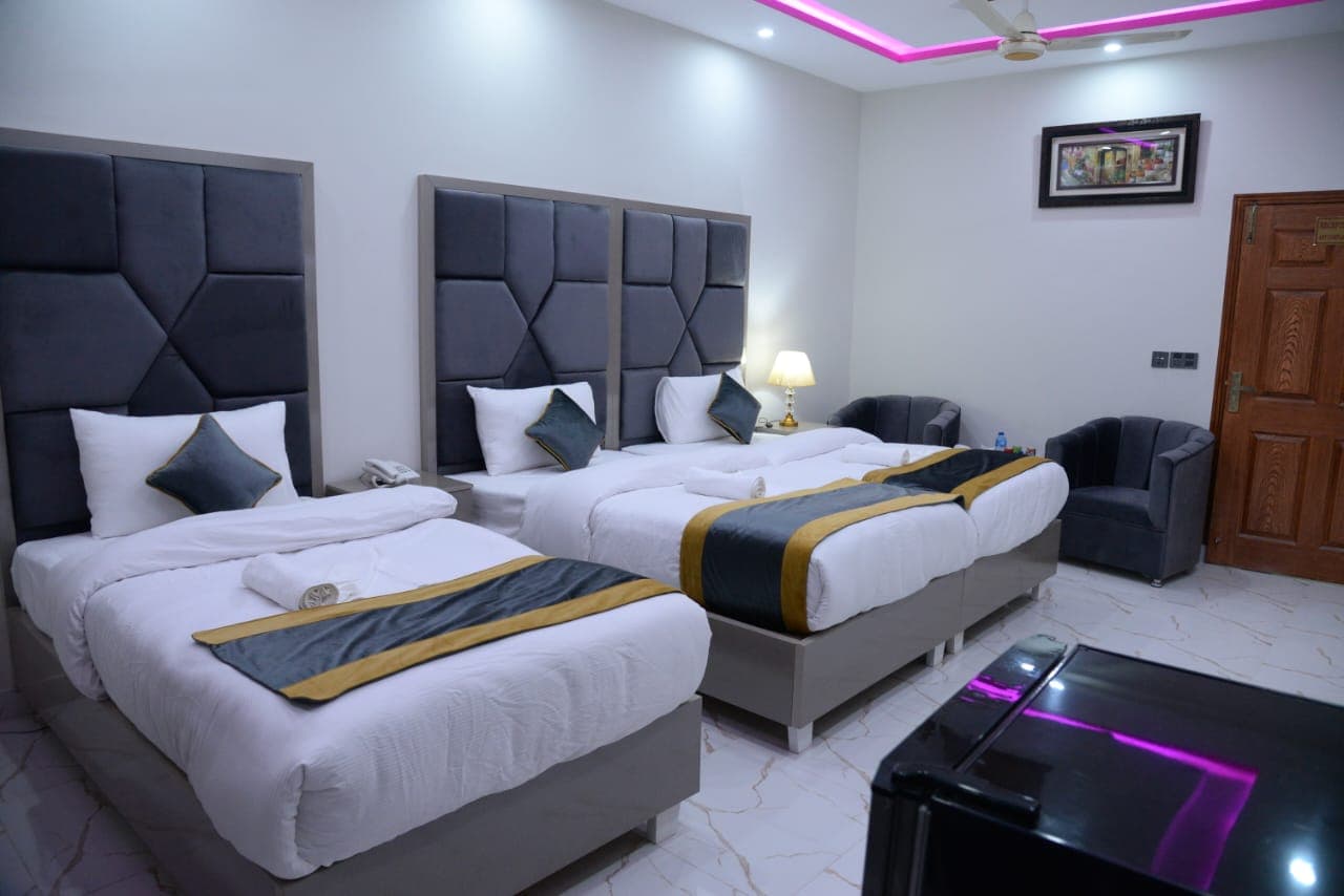 Go Luxury Grand Hotel Lahore Deluxe Triple Room